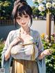 A woman in a kimono standing in front of a flowering tree.